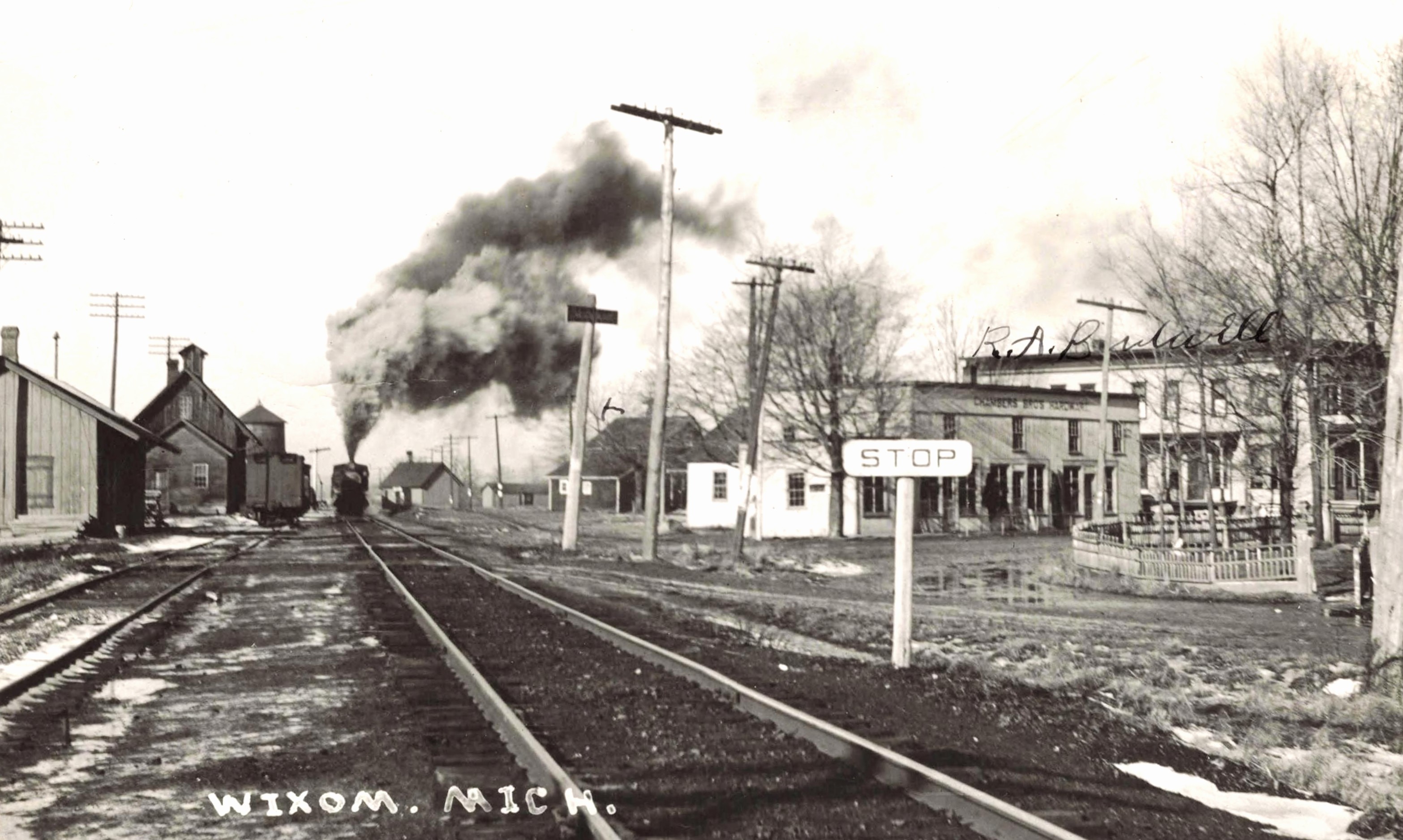 Wixom crossing with stop sign